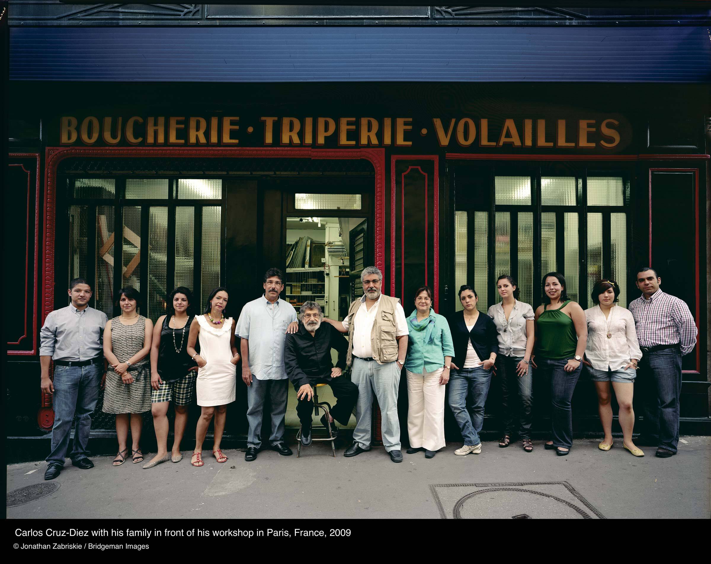 Carlos Cruz-Diez with his family in front of his workshop in Paris, France 2009